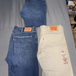 2 pairs Levi jeans 1 pair Lee jeans