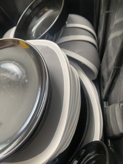 Crate Full Of Plates And Bowls