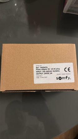 Somfy 1002947A power adaptor with a US AC plug for motorized window treatments