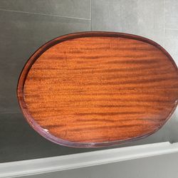 Small oval wooden table with glass removable top