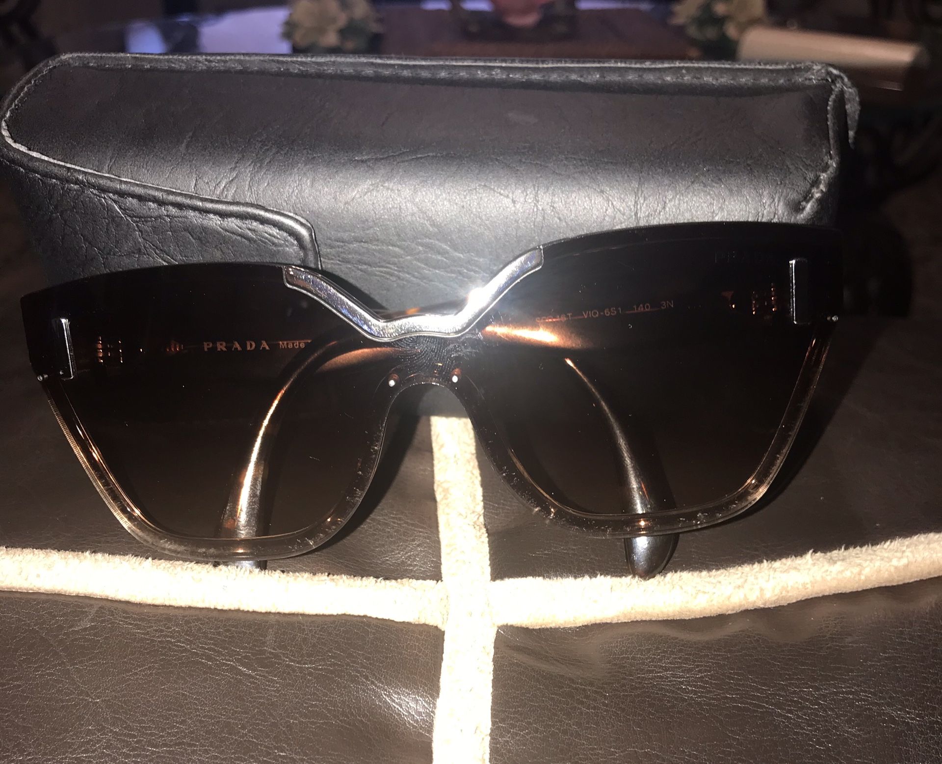 Original Prada ladies sunglasses with case.New never used
