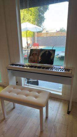 Casio Privia Weighted Keyboard with stand and chair