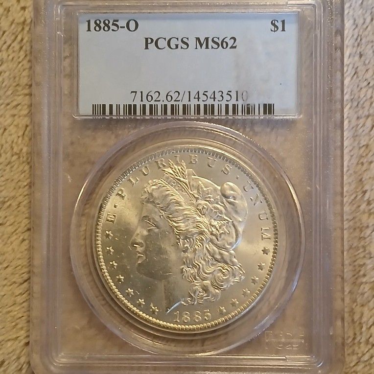 1885 O MORGAN DOLLAR.