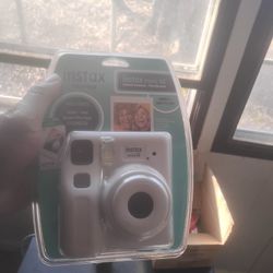 Brand New Polaroid Camera In A John Deere Riding Lawn Mower