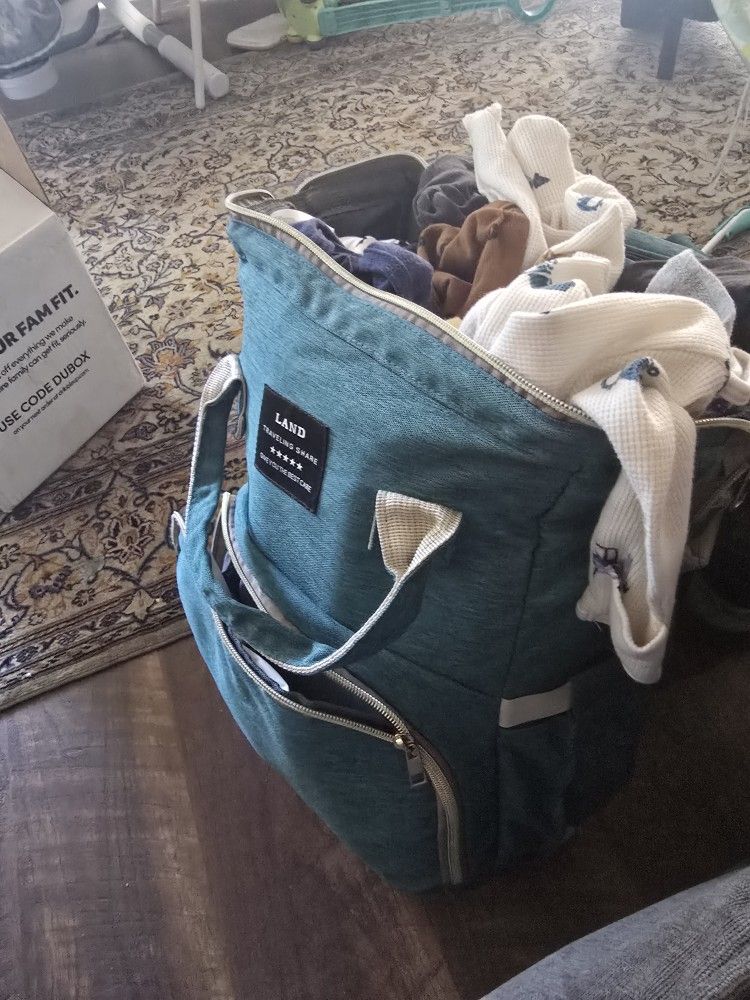 Newborn Clothes And Diaper Bag