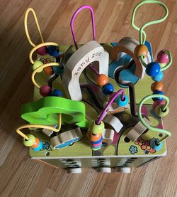 B. toys Zany Zoo Wooden Activity Cube