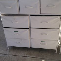 A Set Of White 9 Drawer Dressers