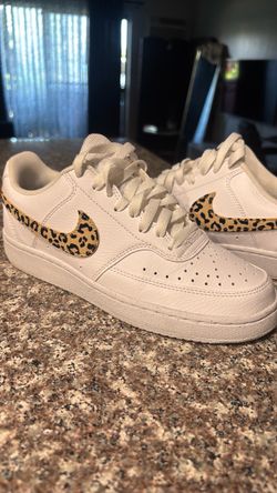 Nike leopard checkmark