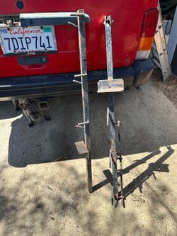 Weed wacker holder for truck