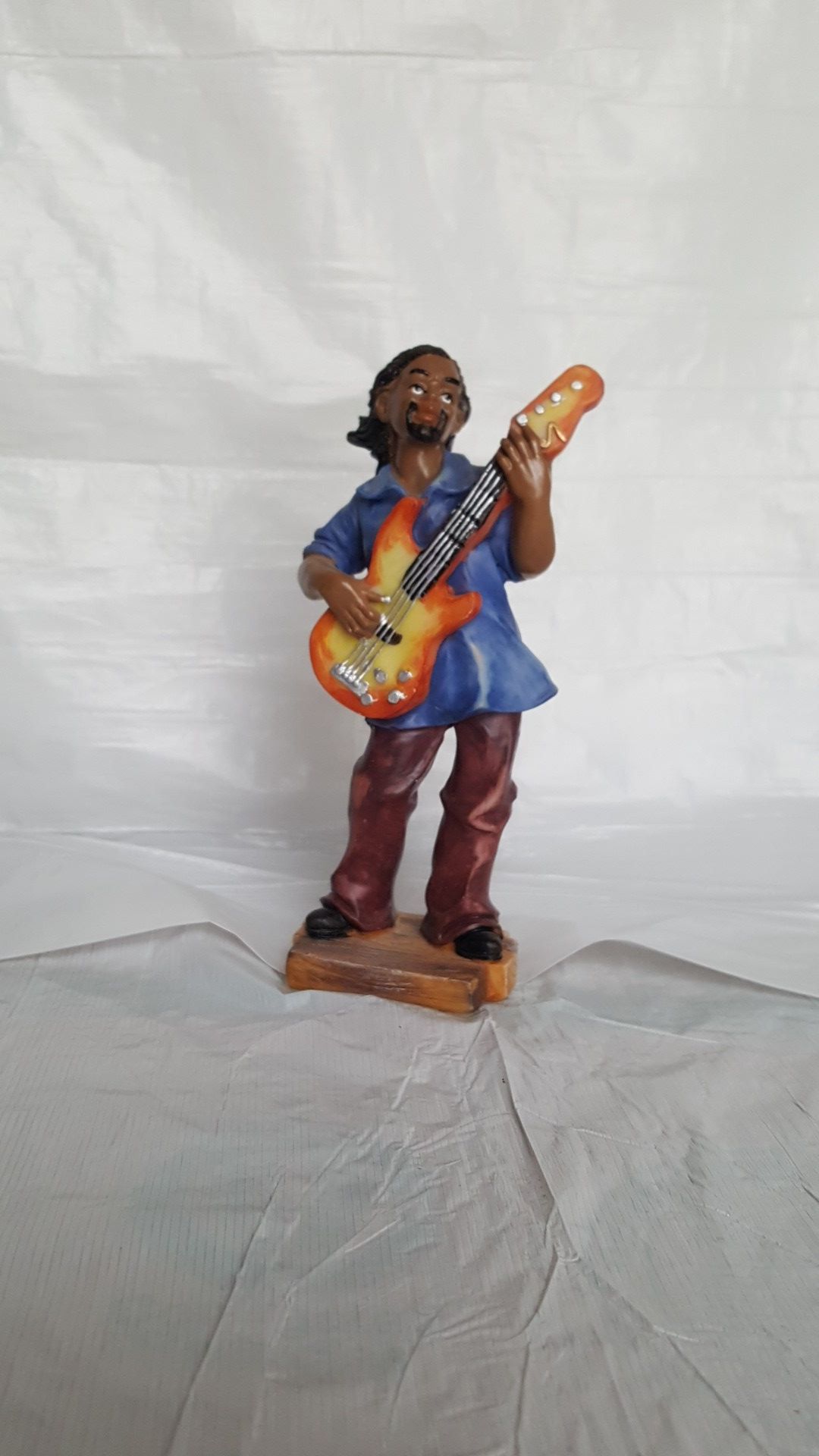 Guitar man figurines