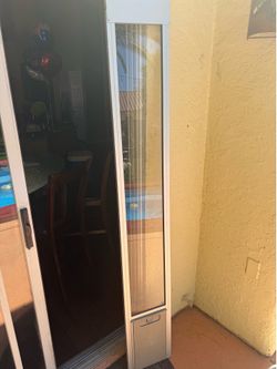 Doggy door for sliding doors