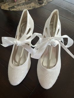 Woman’s White Wedding Shoes