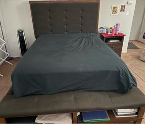 Queen size bed- wood.