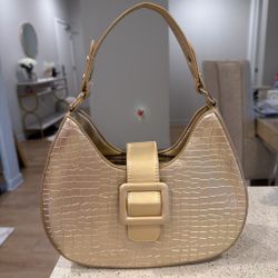 Gold crocodile handbag