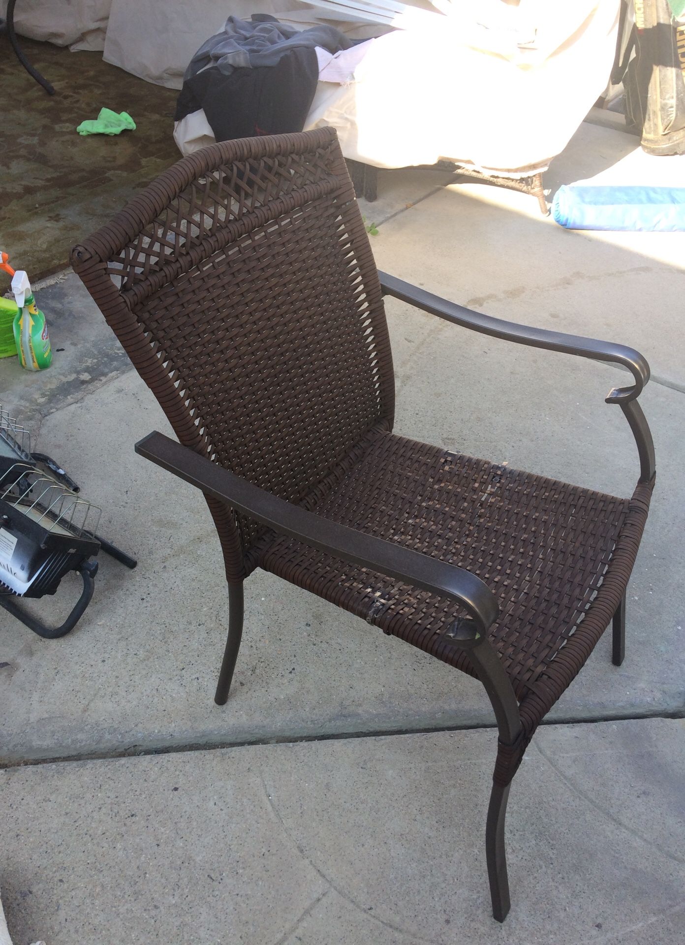 Metal wicker chair brown in color