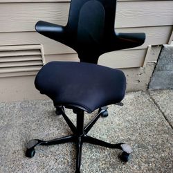 HAG Capisco Puls Adjustable Standing Desk Chair - Black Frame - Black Partial Cushion
