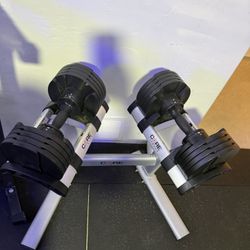 Core Fitness Adjustable Dumbbells (5–50 lb) w/ Stand
