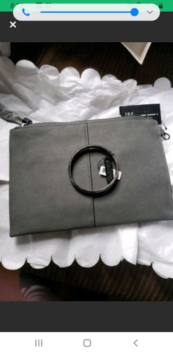 Brand new clutch and bracelet