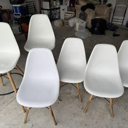 4 dining room chairs, 2 taller chairs for the counter