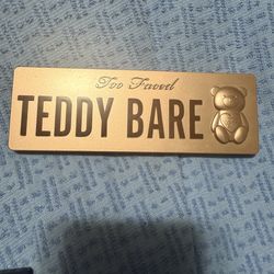 Two-faced teddy bear