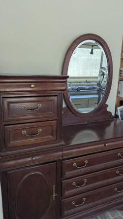 Beautiful Wood dresser with beveled edge morror