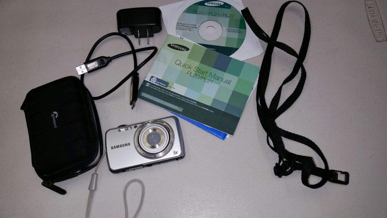 Samsung camera. zoom lens. 4.9- 24.5mm Samsung pl20