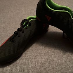 Adidas X Speedportal.4 Firm Ground (FG/FxG) soccer cleats in core black, solar red, and solar green