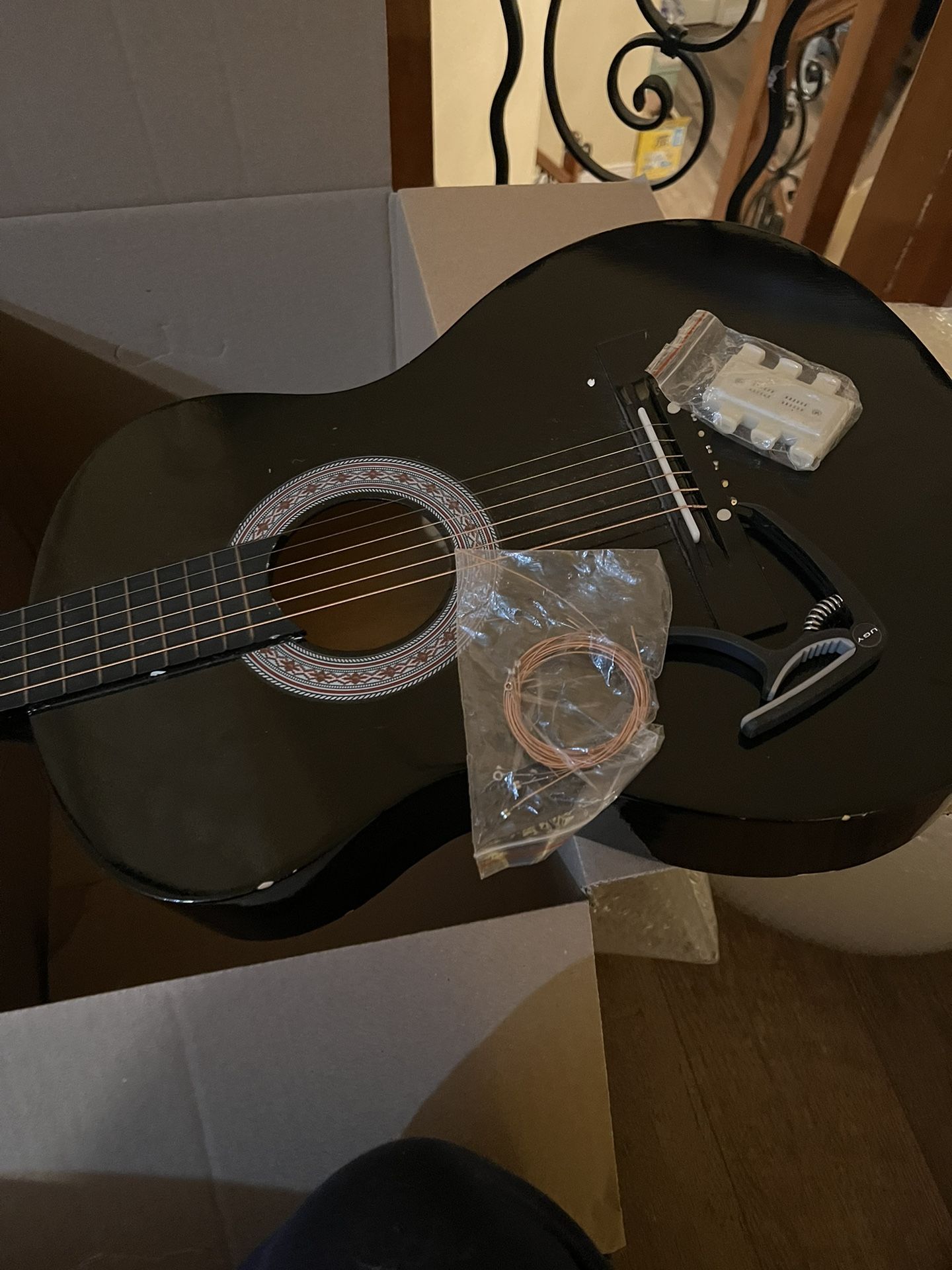 black acoustic guitar