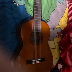 it’s an acoustic guitar never used it it had a few scratches but works rlly good 