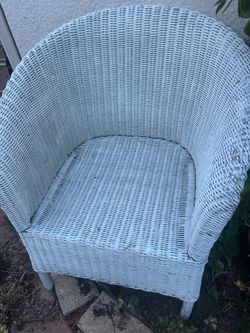 Shabby chic white wicker chair