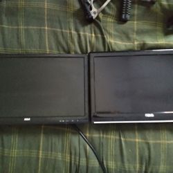 Two  20 Inch Tvs.  With Built In DVD Players