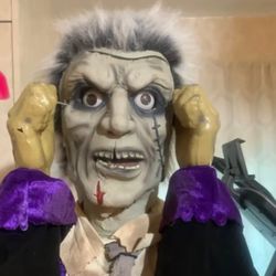 Halloween animatronic fully works rips off face to reveal a spooky face underneath the eyes move, and he lights up as well mouth move as w well saying
