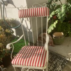 Childs 1950’s White metal rocking chair with red and white striped cushions.