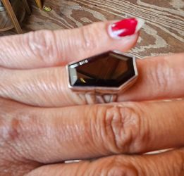 Coffin shaped ring with garnet stone