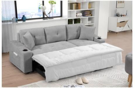 BRAND NEW SECTIONAL COUCH WITH CUP HOLDERS AND PULL OUT BED