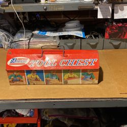 Vintage 1960s child’s tool kit with tools