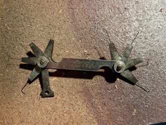 Snap on spark plug guager