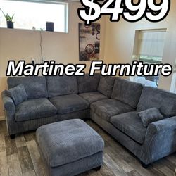 BRAND NEW DARK GREY SECTIONAL SOFA WITH OTTOMAN NEW IN BOXES 
