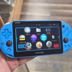 Sony PS Vita Slim Handheld Console Blue with digital games