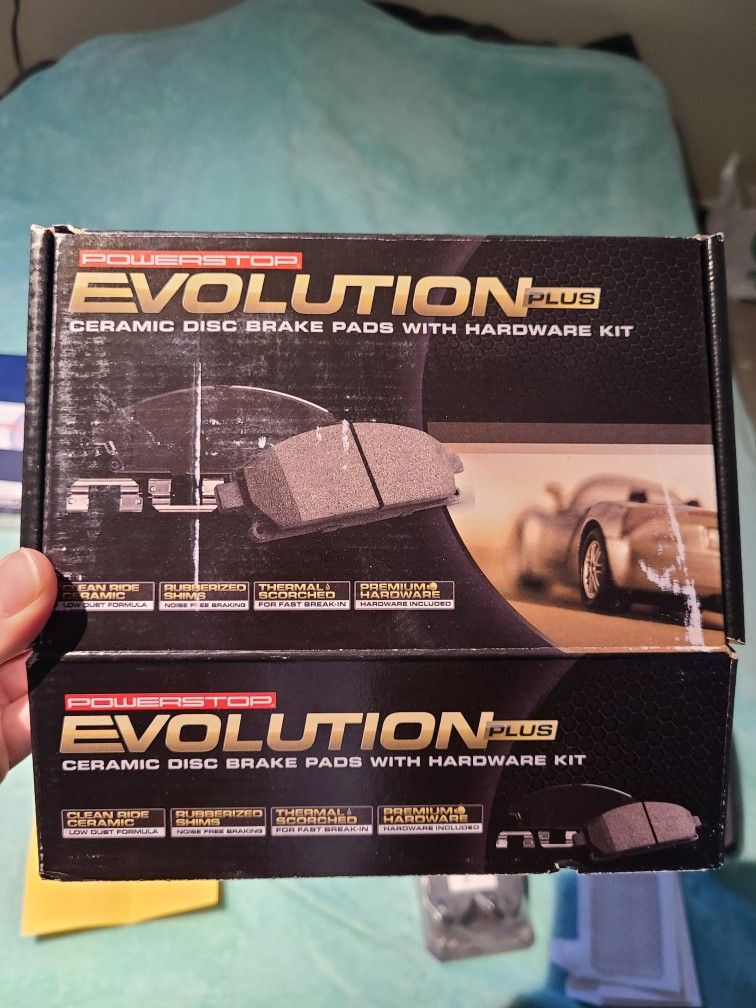 Two Rotors And Front Brake Pads