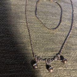 Silver Neckless And Breclet.