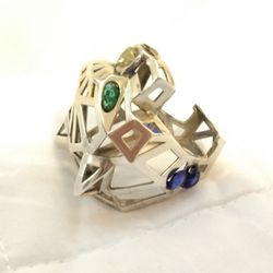 PANTHER RING W/ SAPPHIRES, YELLOW DIAMOND,AND EMERALDS