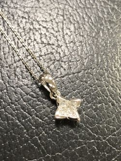 Star shape gold and diamond pendant