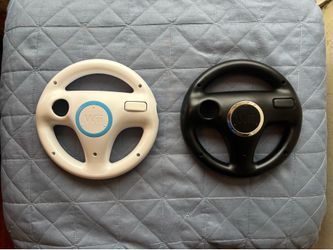 Wii Steering Wheels ( 5 Dollars Each )