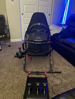 Logitech racing sim with racing cockpit