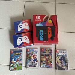 Nintendo Switch OLED w/ 2 Controllers & 4 Games