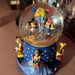 Walt’s 100th yr musical snowglobe