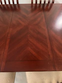Solid wood dining table with six chairs