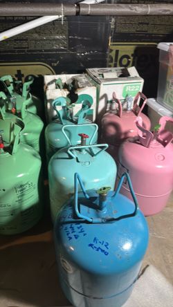 Various cylinders full of freons varieties r22 r134 r410  -hot shot virgin refrigerants not recycled or reconditioned