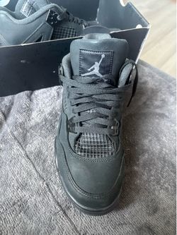 Black cat jordan 4s